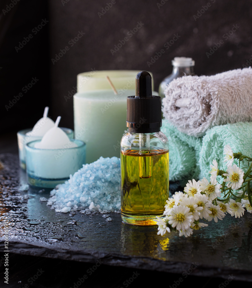Spa set with candles, selective focus, space for text