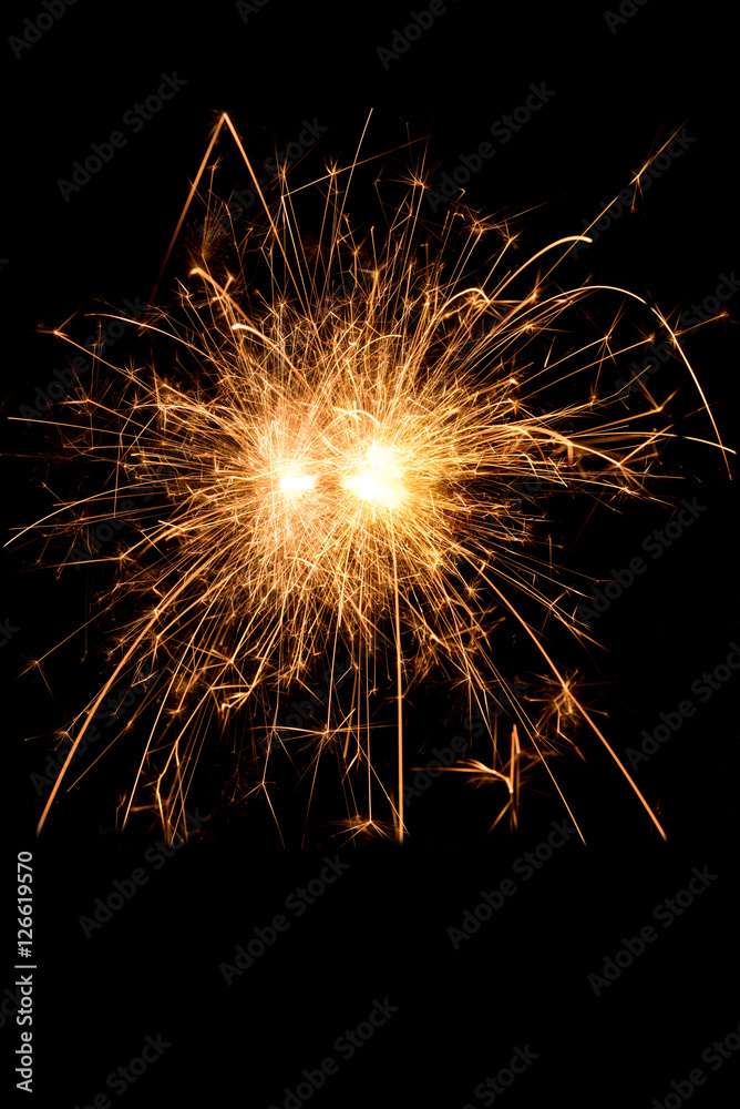 Fototapeta premium Christmas and new year party sparkler on black