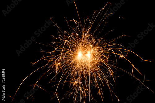 Christmas and new year party sparkler on black