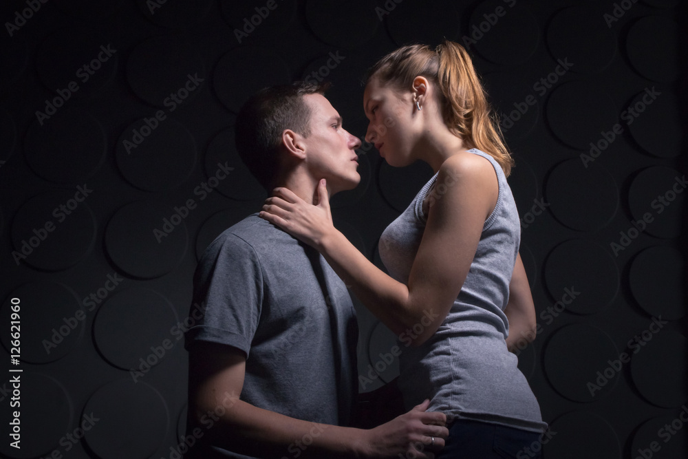 Passionate young couple in the room Passionate young couple in the room