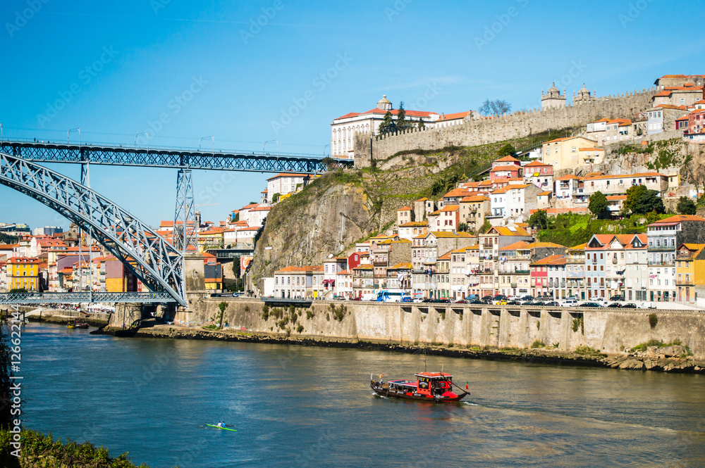 Obraz premium Old Porto cityscape skyline with Dom Luis I Bridge and Douro River in Porto, Portugal