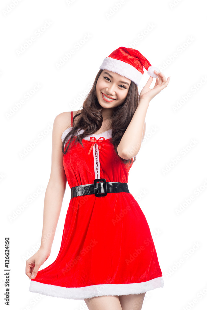 Christmas Woman. Beauty Asian Model Girl in Santa Costume isolat Christmas Woman. Beauty Asian Model Girl in Santa Costume isolat
