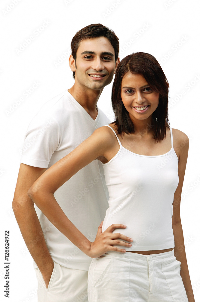 Couple standing and looking at camera Couple standing and looking at camera