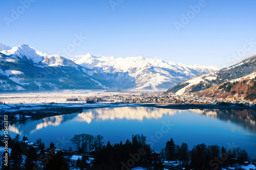 Scenic view on sunny mountain landscape with winter lake in Zell