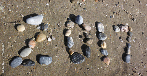 sea pebbles on sand
