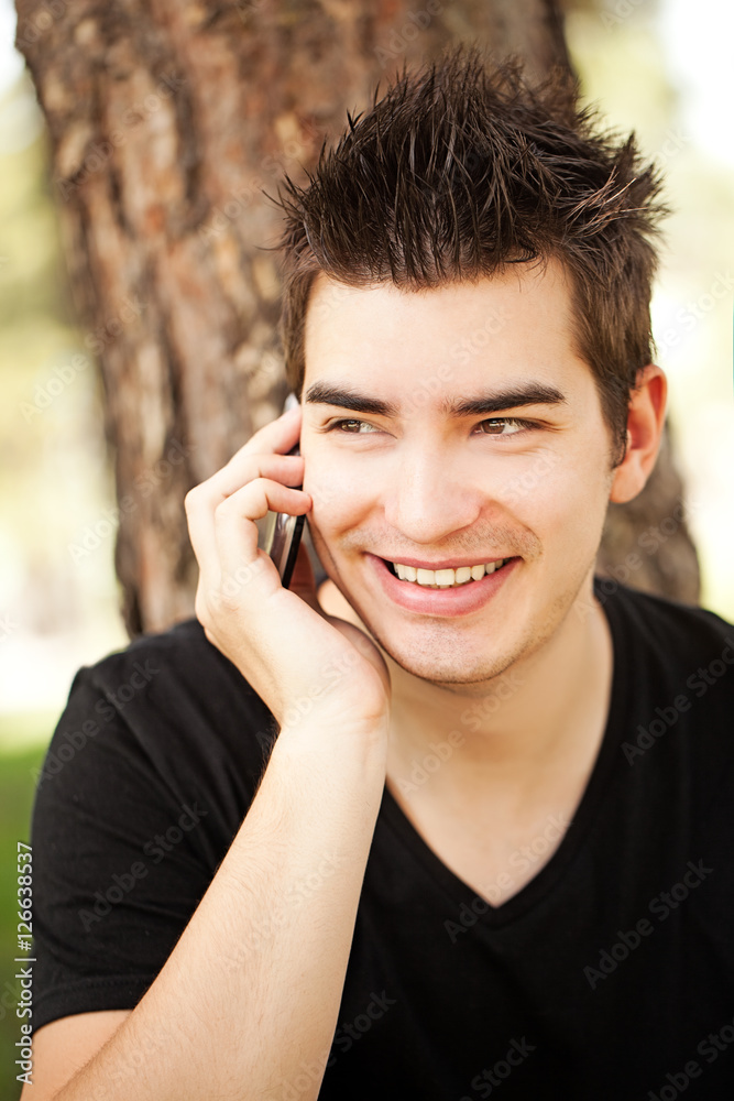 Smiling Man Making a Phone Call Smiling Man Making a Phone Call