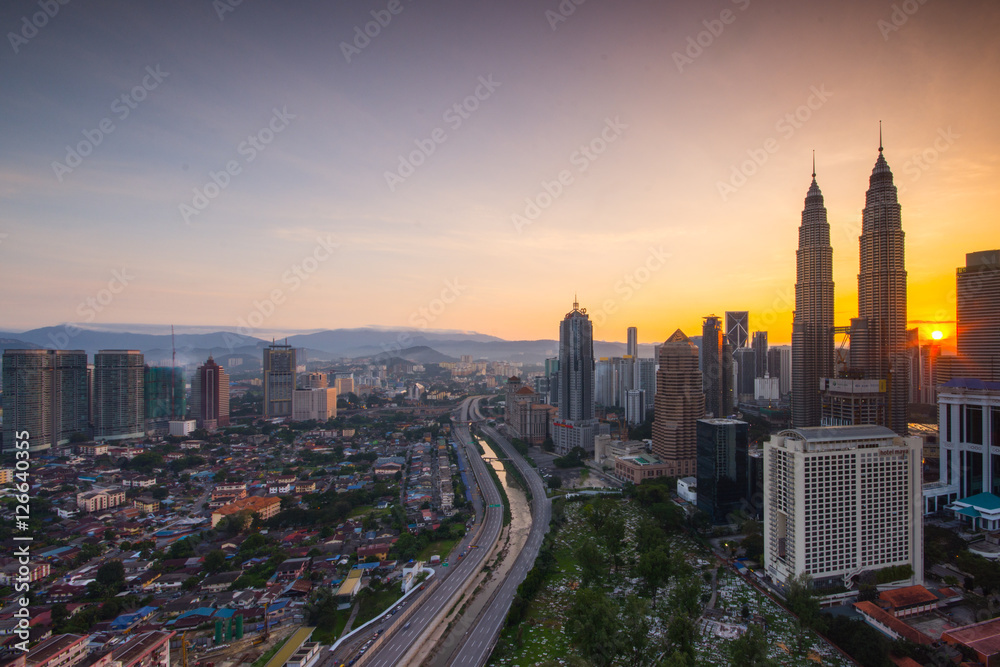 Kuala Lumpur city skyline during sunrise