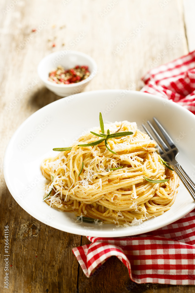Pasta with tomato sauce and fresh rosemary