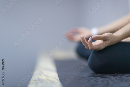Woman Doing Yoga Exercises In Gym, Closeup Sport Fitness Girl Sitting Lotus Pose Meditation Relaxation