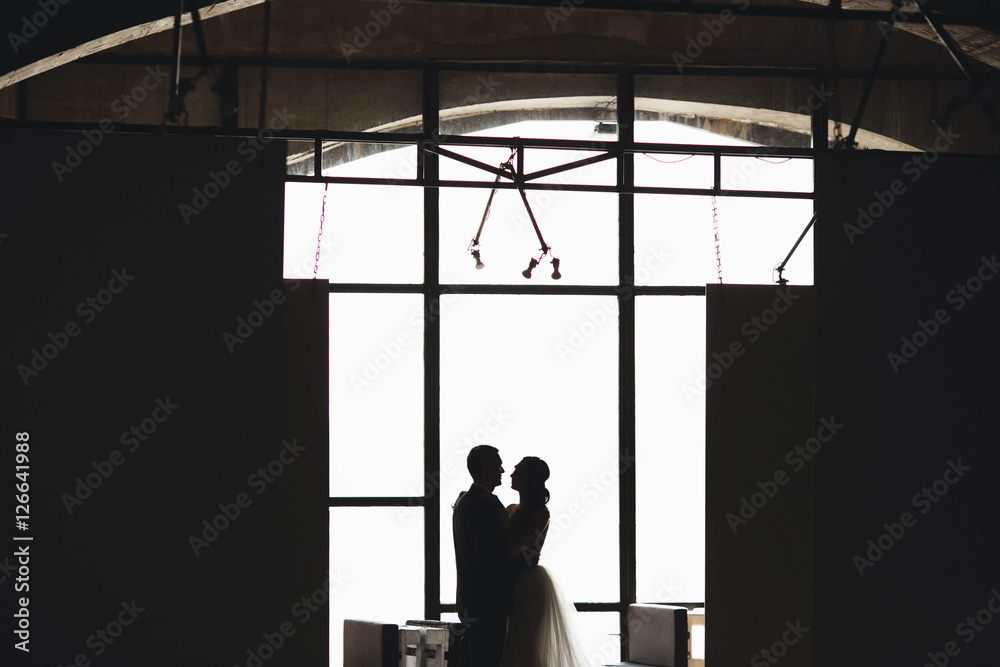 Fototapeta premium happy man hugging his beloved woman