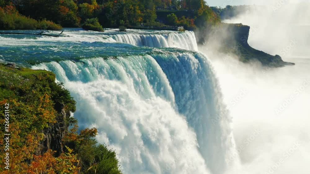 The famous waterfall Niagara Falls, a popular spot among tourists from all over the world. The view from the American side. Slow motion ProRes HQ 422 10 bit video