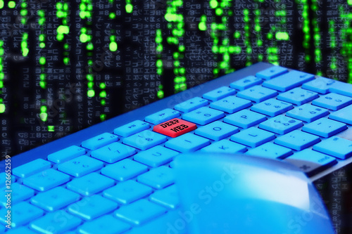 Close up of keyboard, blue light. Red key for deep web. Selective focus. 
Black and green technologic background. Keyboard and mouse in foreground.
