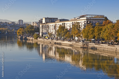 The embankment of Kura River near the Rike Park and the President Palace above it