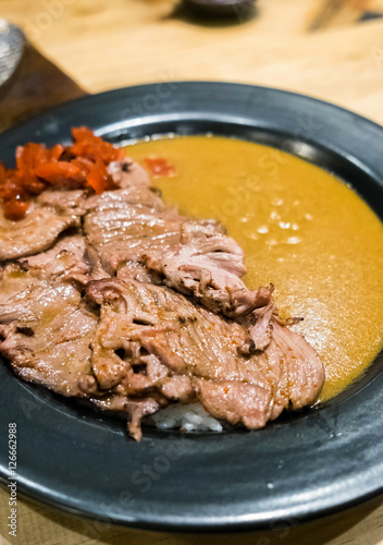 Japanese beef curry tasty in black plate