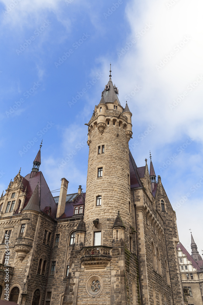 View on 17th century  Moszna Castle on a sunny day, Poland