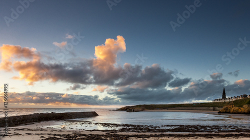 Dawn at Cullercoats Bay, North Tyneside, Engalnd, UK. From North Pier looking southward. photo