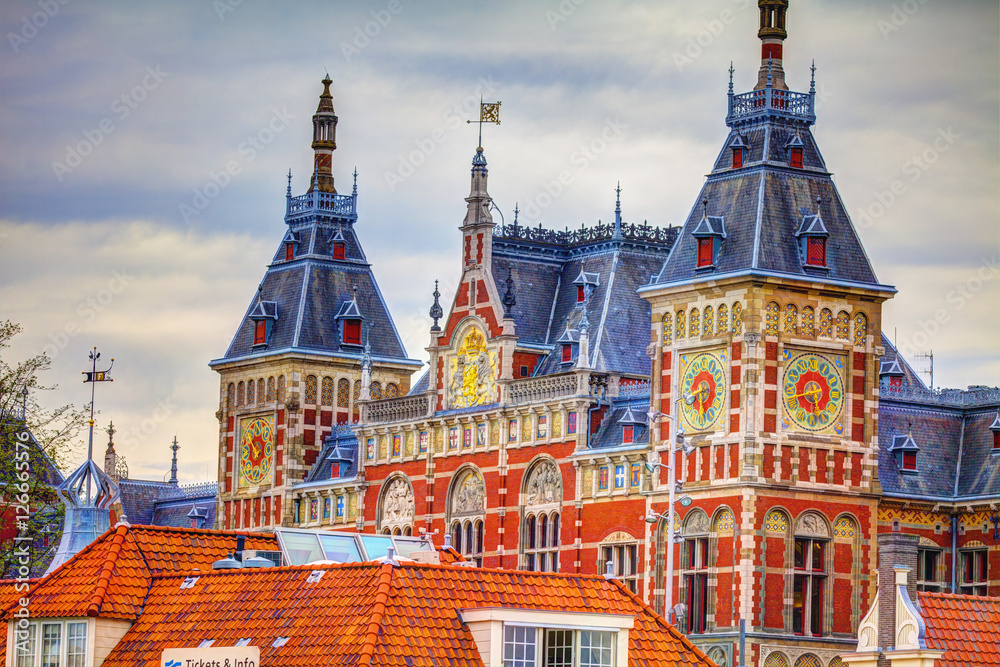 Amsterdam Central Train Stationbuilt in the Neo-Renaissance style designed by Pierre Cuypers and A. L. van Gendt, HDR Image.