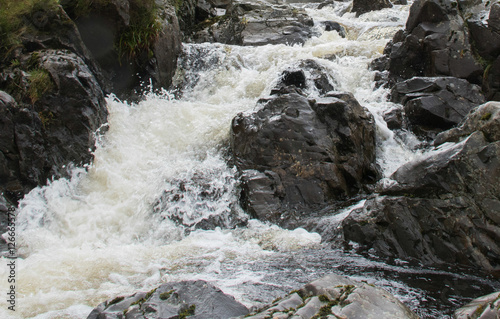 White Water And Rocks