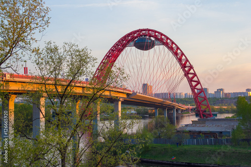 Picturesque bridge - arch, steel cable-stayed bridge across the Moscow river, is located in the West of Moscow © byallasaa