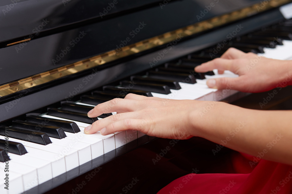 Piano hands pianist playing Musical instruments details with player hand closeup