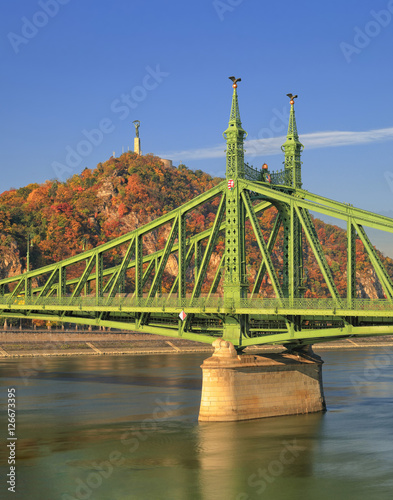 The Gellert Hill (Hungarian: Gellért hegy) and the Freedom / Liberty Bridge  (Hungarian: Szabadság híd) over the Danube river (Hungarian: Duna) in Budapest at autumn.