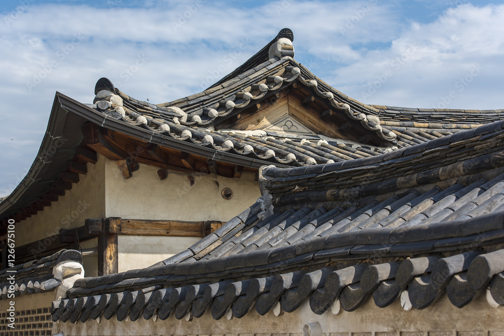 Old Korean architecture at Bukchon Hanok village - Seoul, South Korea. Old Korean architecture at Bukchon Hanok village - Seoul, South Korea.