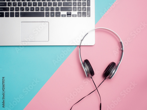 Top view of colorful concept , notebook , headphone on color background for create idea for business or design .Relax coffee time (flat lay)