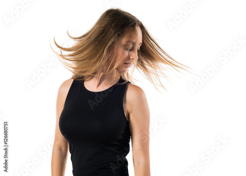 Blonde teen girl posing in studio