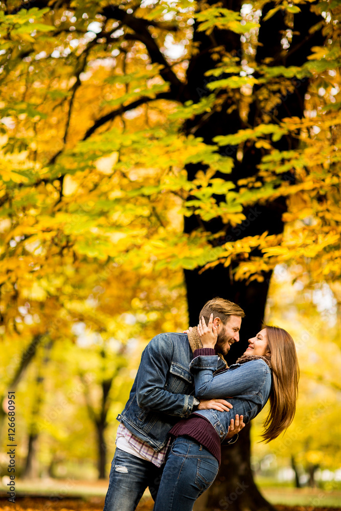 Young couple in the autumn park