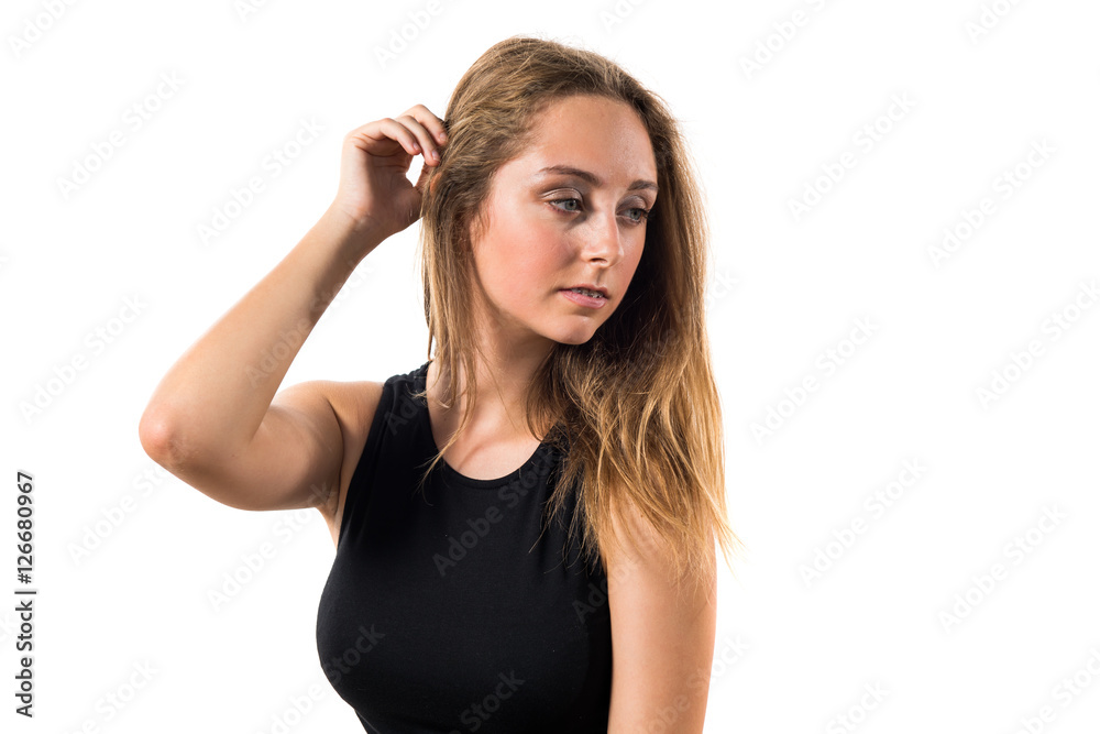 Blonde teen girl posing in studio