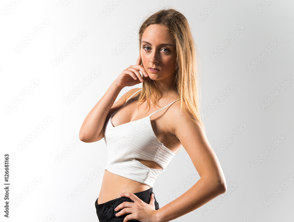 Fototapeta premium Blonde teen girl posing in studio