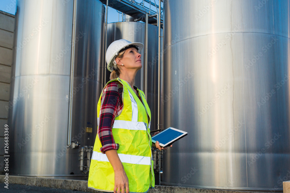 female engineer taking notes