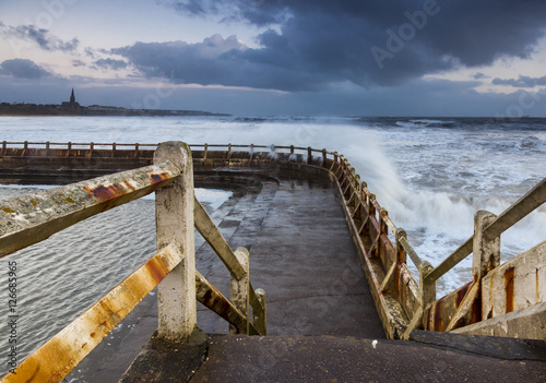 Old Tynemouth Outdoor Pool on a cold and stormy morning.