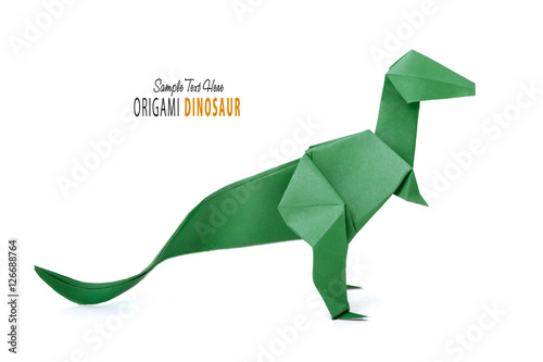 Origami dinosaur on white