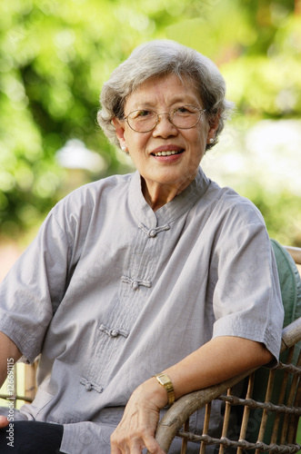 Obraz na płótnie Portrait of senior woman, smiling at camera w salonie