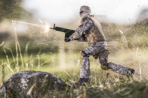 Soldier about to hit an explosive