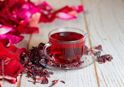 Red Hibiscus tea in glass mug