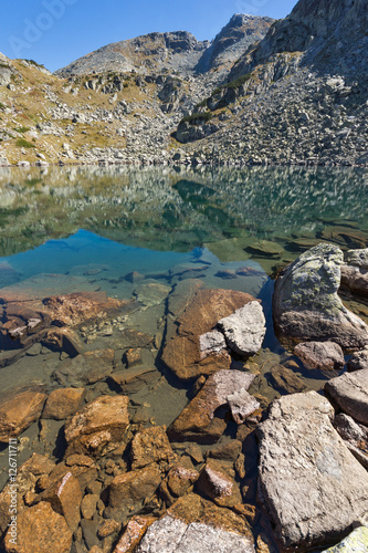 Amazing view of Lake and reflection of Preokorets (Popova Kapa) peak, Rila Mountain, Bulgaria photo