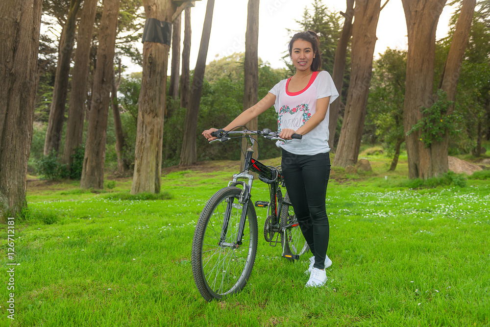 Naklejka premium Asian gril and bikcycle