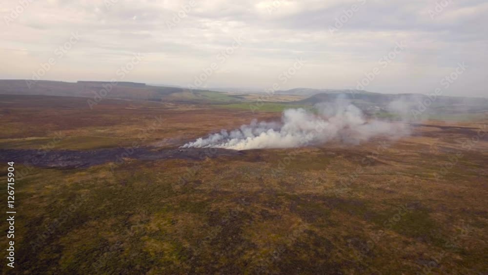 Wild fire in the highlands, nature reserve, UK, Yorkshire. Aerial view Wild fire in the highlands, nature reserve, UK, Yorkshire. Aerial view