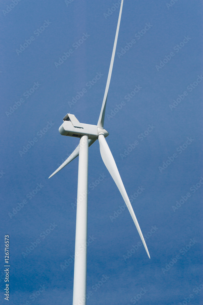 wind turbine with blue sky at background wind turbine with blue sky at background