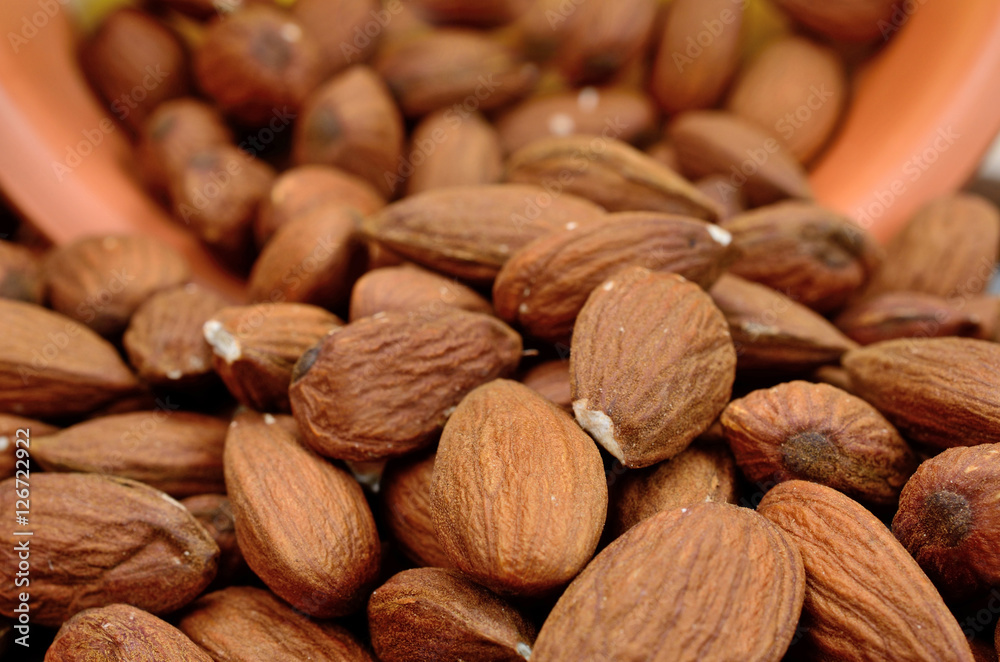 group of almond with bowl group of almond with bowl