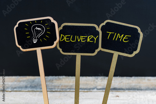 Concept message DELIVERY TIME and light bulb as symbol for idea