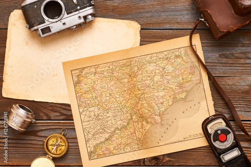 Vintage cameras and lenses on antique XIX century map
