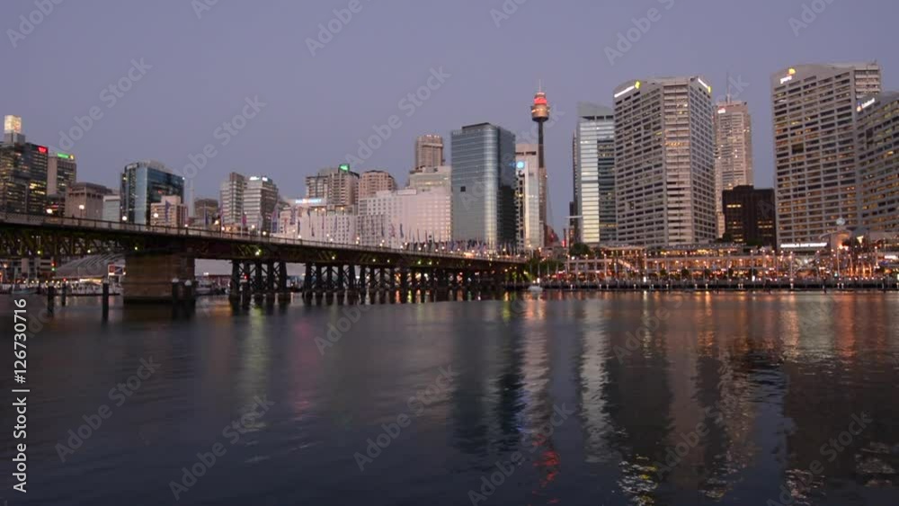 Cityscape of Darling Harbour at dusk, a recreational and pedestrian precinct situated on western outskirts of the Sydney central business district in New South Wales, Australia. Cityscape of Darling Harbour at dusk, a recreational and pedestrian precinct situated on western outskirts of the Sydney central business district in New South Wales, Australia.