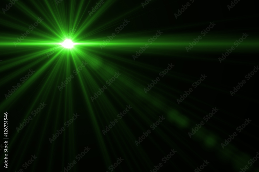 abstract lens flare green  light over black background