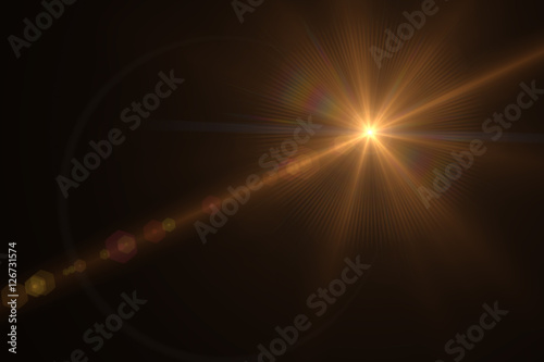Obraz na plátně abstract lens flare yellow light over black background