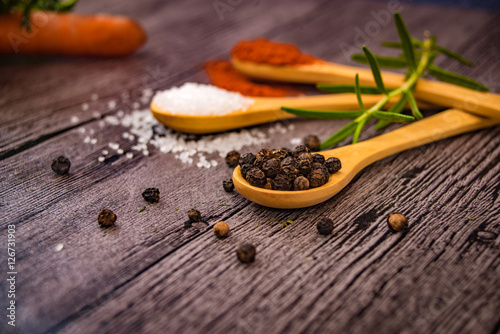 Fototapeta Naklejka Na Ścianę i Meble -  species and herbs on wooden table