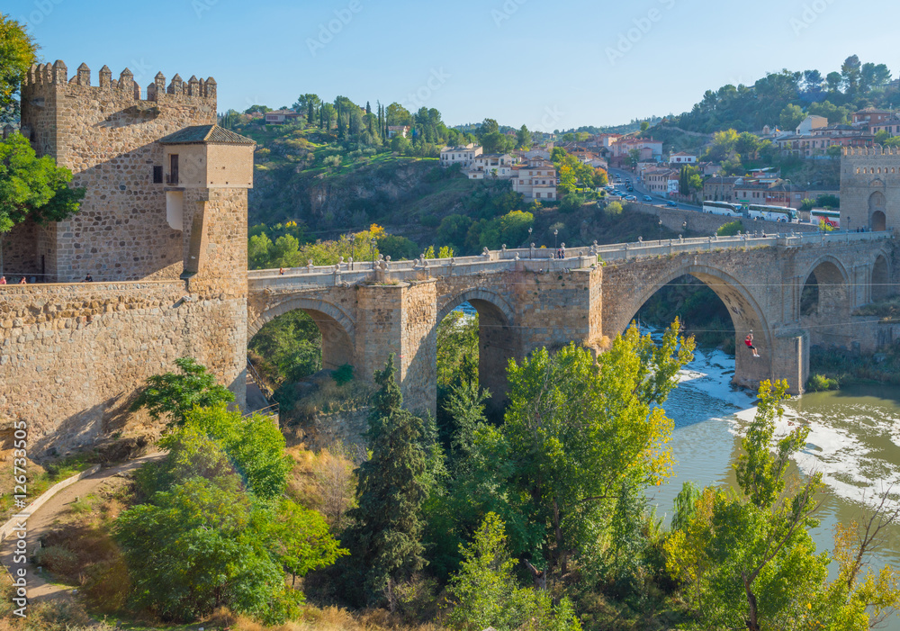 Medieval bridge over a river in Toledo