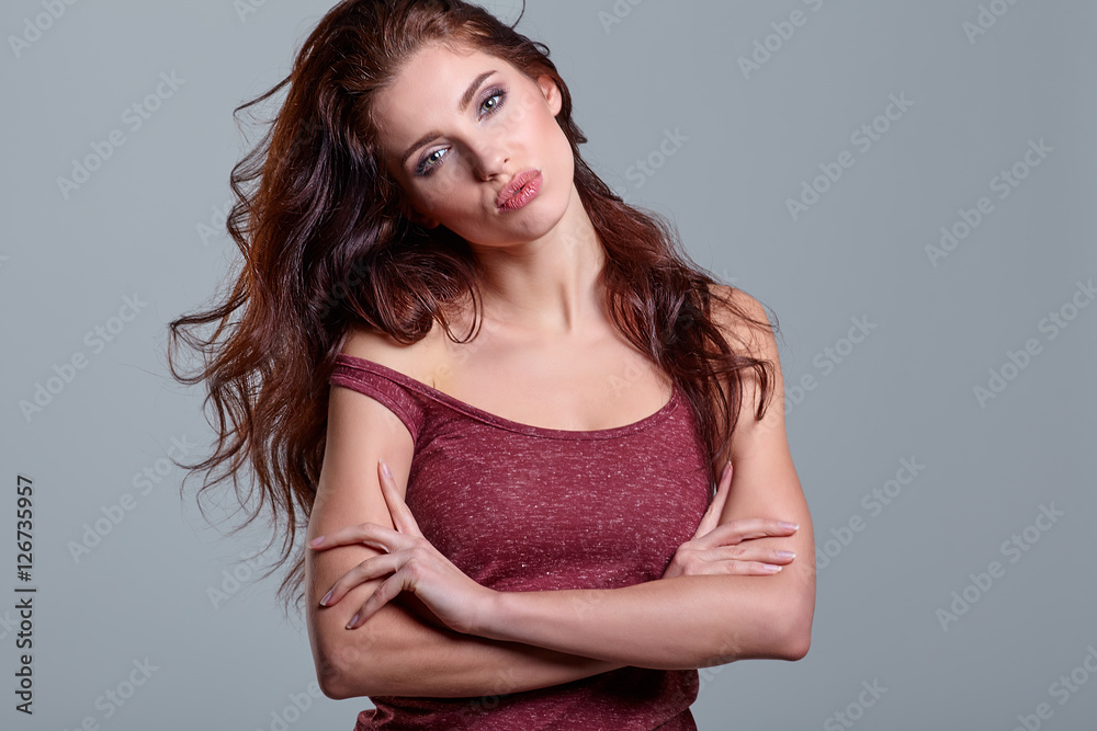 Young sensual girl in fashion clothes pose in studio Young sensual girl in fashion clothes pose in studio